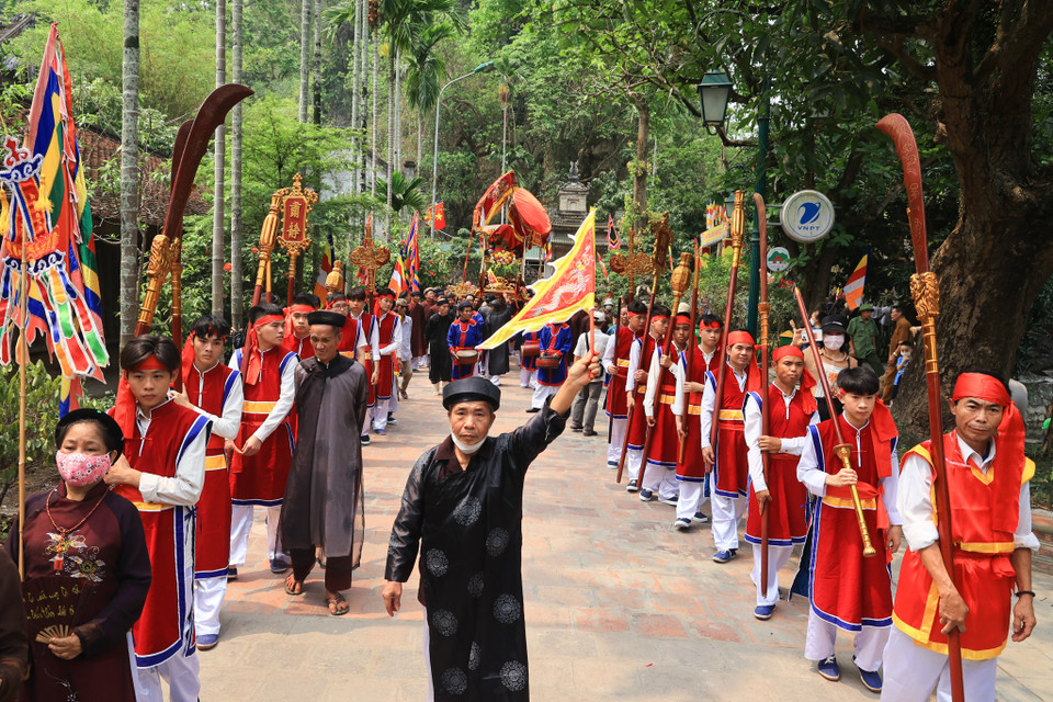 Lễ hội có phần lễ gồm: Chương trình khai hội, lễ Mộc dục, lễ phục nghinh bài vị, lễ cúng yên vị, lễ tế và lễ rước của các thôn. (Ảnh: Hoài Nam/Vietnam+)