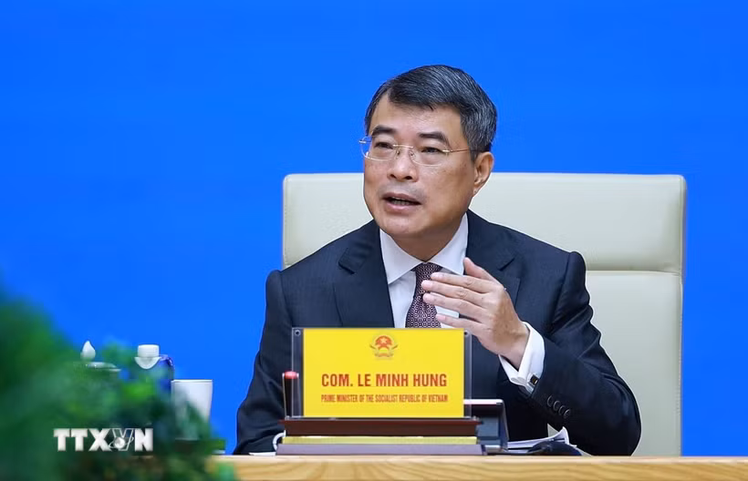 Thủ tướng Lê Minh Hưng gặp, trao đổi với các doanh nghiệp Trung Quốc đang đầu tư tại Việt Nam. (Ảnh: Dương Giang/TTXVN)