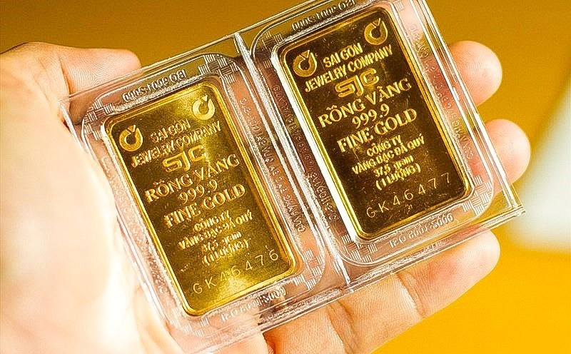 Lợi dụng nhu cầu mua vàng tăng cao, thời gian gần đây nhiều fanpage giả mạo tràn lan nhằm lừa đảo khách hàng. (Ảnh: Vietnam+) 