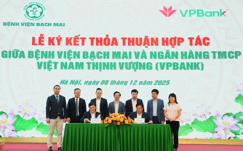 Đại diện 2 đơn vị tại Lễ ký kết thỏa thuận hợp tác. (Ảnh: Vietnam+)