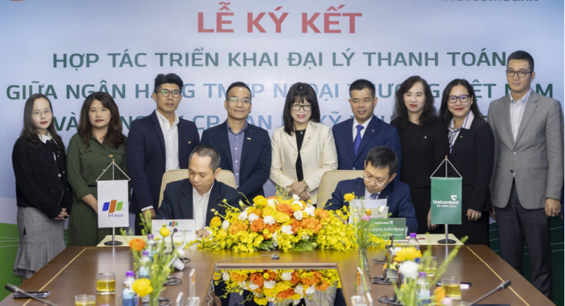 FPT Retail và Vietcombank triển khai mô hình đại lý thanh toán. (Ảnh: Vietnam+)