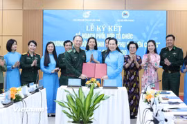 Lễ ký kết Kế hoạch phối hợp và tổ chức Chương trình “Đồng hành cùng phụ nữ biên cương” giai đoạn 2026 - 2030 giữa Hội Liên hiệp Phụ nữ và Bộ Tư lệnh Bộ đội Biên phòng. (Ảnh: PV/Vietnam+)