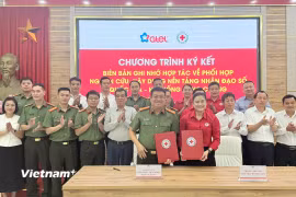 Trung ương Hội Chữ thập đỏ Việt Nam và Tổng công ty Công nghệ - Viễn thông Toàn cầu ký kết Biên bản ghi nhớ hợp tác về nghiên cứu và xây dựng phương án Nền tảng Nhân đạo số quốc gia. (Ảnh: PV/Vietnam+)
