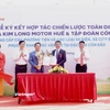 Ký kết hợp tác giữa 2 đơn vị. (Ảnh: PV/Vietnam+)