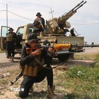 Các lực lượng Iraq tham gia chiến dịch truy quét IS tại al-Miqdadiyah, tỉnh Diyala, Iraq, ngày 10/3/2024. (Ảnh: AFP/TTXVN)