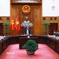 Thủ tướng Phạm Minh Chính chủ trì cuộc họp với lãnh đạo tỉnh Quảng Trị về xây dựng nhà ở cho các gia đình bị thiệt hại do thiên tai tại Quảng Trị. (Ảnh: Dương Giang/TTXVN)