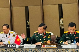 Thượng tướng Hoàng Xuân Chiến, Ủy viên Trung ương Đảng, Ủy viên Thường vụ Quân ủy Trung ương, Thứ trưởng Bộ Quốc phòng phát biểu tại Đối thoại. (Ảnh: Đỗ Quyên/TTXVN)