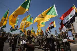Lực lượng dân quân Kataib Hezbollah hoạt động ở Iraq nhưng hoàn toàn tuân phục Iran. (Ảnh: AFP)