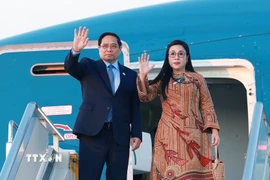 Thủ tướng Phạm Minh Chính và Phu nhân kết thúc chuyến tham dự Hội nghị Thượng đỉnh G20 tại Nam Phi. (Ảnh: Dương Giang/TTXVN)