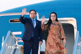 Thủ tướng Phạm Minh Chính và Phu nhân kết thúc chuyến tham dự Hội nghị Thượng đỉnh G20 tại Nam Phi. (Ảnh: Dương Giang/TTXVN)