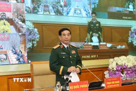 Đại tướng Phan Văn Giang chủ trì hội nghị. (Ảnh: Hồng Pha/TTXVN phát)