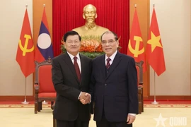 Nguyên Tổng Bí thư Nông Đức Mạnh tiếp Tổng Bí thư, Chủ tịch nước Lào
