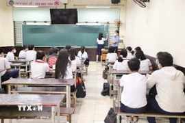 Học sinh Trường THPT Trưng Vương. (Ảnh: Hồng Giang/TTXVN)