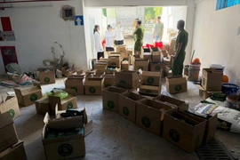 Phòng Cảnh sát Kinh tế Công an tỉnh Lâm Đồng kiểm tra một cơ sở sản xuất càphê giả. (Nguồn: Công an tỉnh Lâm Đồng)