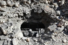 Hiện trường cuộc không kích của Israel xuống Damascus, Syria tháng 3/2025. (Ảnh: THX/TTXVN)