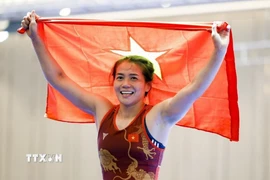 Nguyễn Thị Mỹ Hạnh - một trong những niềm hy vọng giành Huy chương Vàng tại SEA Games 33 của đội tuyển Vật Quốc gia. (Ảnh: Minh Quyết/TTXVN)