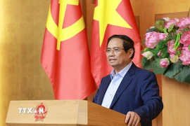 Thủ tướng Phạm Minh Chính phát biểu tại buổi làm việc với Ban Nghiên cứu phát triển kinh tế tư nhân (Ban IV). (Ảnh: Dương Giang/TTXVN)