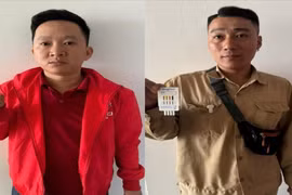 Các đối tượng Trần Mạnh Linh và Phan Văn Tiến tại cơ quan Công an. (Ảnh: Công an cung cấp)