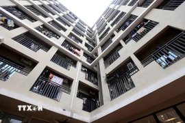 Nhà ở xã hội là nhu cầu cần thiết với bộ phận người có thu nhập thấp và công nhân đang làm việc tại các khu công nghiệp. (Ảnh: Tuấn Anh/TTXVN)