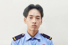 Đối tượng Lý Hoàng Nam tại cơ quan công an.