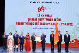 Tổng Bí thư Tô Lâm trao Huân chương Lao động hạng Nhất tặng Cục Thể dục Thể thao Việt Nam (Bộ Văn hóa, Thể thao và Du lịch). (Ảnh: Thống Nhất/TTXVN)