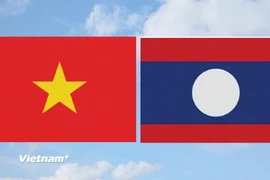 Cờ Việt Nam và cờ Lào. (Ảnh: Vietnam+)