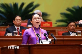 Đồng chí Hà Thị Nga, Ủy viên Trung ương Đảng, Phó Bí thư Thường trực Đảng ủy Mặt trận Tổ quốc, các đoàn thể Trung ương, Phó Chủ tịch, Tổng Thư ký Ủy ban Trung ương Mặt trận Tổ quốc Việt Nam, tham luận về vấn đề “Phát huy sức mạnh đoàn kết toàn dân tộc – nền tảng, động lực quan trọng thực hiện thắng lợi các mục tiêu phát triển đất nước trong kỷ nguyên mới”. (Ảnh: TTXVN)