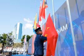 Lễ thượng cờ Đoàn thể thao Việt Nam tại SEA Games 33. (Ảnh: Minh Quyết/TTXVN)