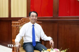 Chủ tịch UBND tỉnh Vĩnh Long Lữ Quang Ngời trả lời phỏng vấn. (Ảnh: Phạm Minh Tuấn/TTXVN)