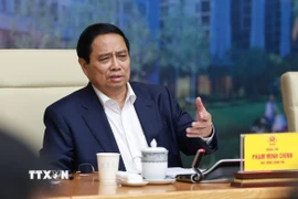 Thủ tướng Phạm Minh Chính chủ trì Hội nghị sơ kết việc thực hiện chỉ tiêu phát triển nhà ở xã hội 7 tháng đầu năm 2025. (Ảnh: Dương Giang/TTXVN)