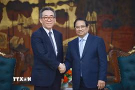 Thủ tướng Phạm Minh Chính tiếp Bộ trưởng Ngoại giao Hàn Quốc Cho Tae-yul. (Ảnh: Dương Giang/TTXVN)