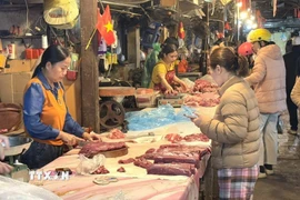 Ngày mùng 6 Tết, thị trường cơ bản trở lại trạng thái bình thường. (Ảnh: Quốc Lũy/TTXVN)