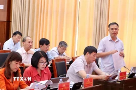 Chủ tịch UBND thành phố Điện Biên Phủ Nguyễn Quang Hưng phát biểu tại Hội nghị. (Ảnh: Trung Kiên/TTXVN)