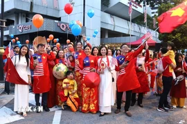 Người Việt trong hoạt động kỷ niệm 80 năm Quốc khánh Việt Nam tại thủ đô Kuala Lumpur, Malaysia. (Ảnh: PV/TTXVN)