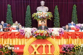 Tổng Bí thư Đảng Nhân dân Cách mạng Lào Thongloun Sisoulith phát biểu tại Đại hội. (Ảnh: TTXVN phát)