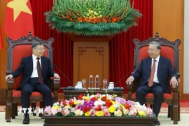 Tổng Bí thư Tô Lâm tiếp đồng chí Lý Thư Lỗi, Ủy viên Bộ Chính trị, Bí thư Ban Bí thư, Trưởng Ban Tuyên truyền Trung ương, Đảng Cộng sản Trung Quốc. (Ảnh: Thống Nhất/TTXVN)