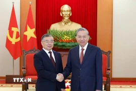 Tổng Bí thư Tô Lâm tiếp đồng chí Lý Thư Lỗi, Ủy viên Bộ Chính trị, Bí thư Ban Bí thư, Trưởng Ban Tuyên truyền Trung ương, Đảng Cộng sản Trung Quốc. (Ảnh: Thống Nhất/TTXVN)
