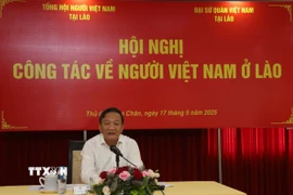 Đại sứ Việt Nam tại Lào Nguyễn Minh Tâm phát biểu chỉ đạo tại Hội nghị. (Ảnh: Xuân Tú/TTXVN)