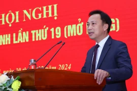 Phó Bí thư Thường trực Đảng bộ Khối các cơ quan Trung ương Lại Xuân Lâm phát biểu khai mạc. (Ảnh: Văn Điệp/TTXVN)