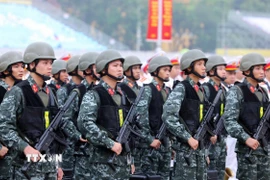 Cán bộ, chiến sỹ Công an nhân dân tham dự buổi Lễ xuất quân. (Ảnh: Phạm Kiên/TTXVN)