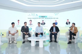 Hội thảo với chủ đề "Thanh toán xuyên biên giới: Xu hướng toàn cầu và giải pháp cho Việt Nam" được tổ chức tại Hà Nội. (Ảnh: PV/Vietnam+)