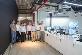 Lãnh đạo Đại học Quốc gia Thành phố Hồ Chí Minh và VNG cắt băng khai trương Saigon AI Hub. (Ảnh: VNG)