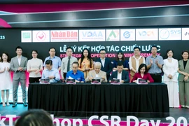 Lễ ký kết và công bố hợp tác cùng các Đối tác của TikTok Shop. (Ảnh: PV/Vietnam+)