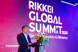 Ông Nguyễn Huy Dũng - Ủy viên chuyên trách Ban Chỉ đạo Trung ương về phát triển khoa học công nghệ, đổi mới sáng tạo và chuyển đổi số phát biểu tại sự kiện Rikkei Global Summit 2025. (Ảnh: Minh Sơn/Vietnam+)