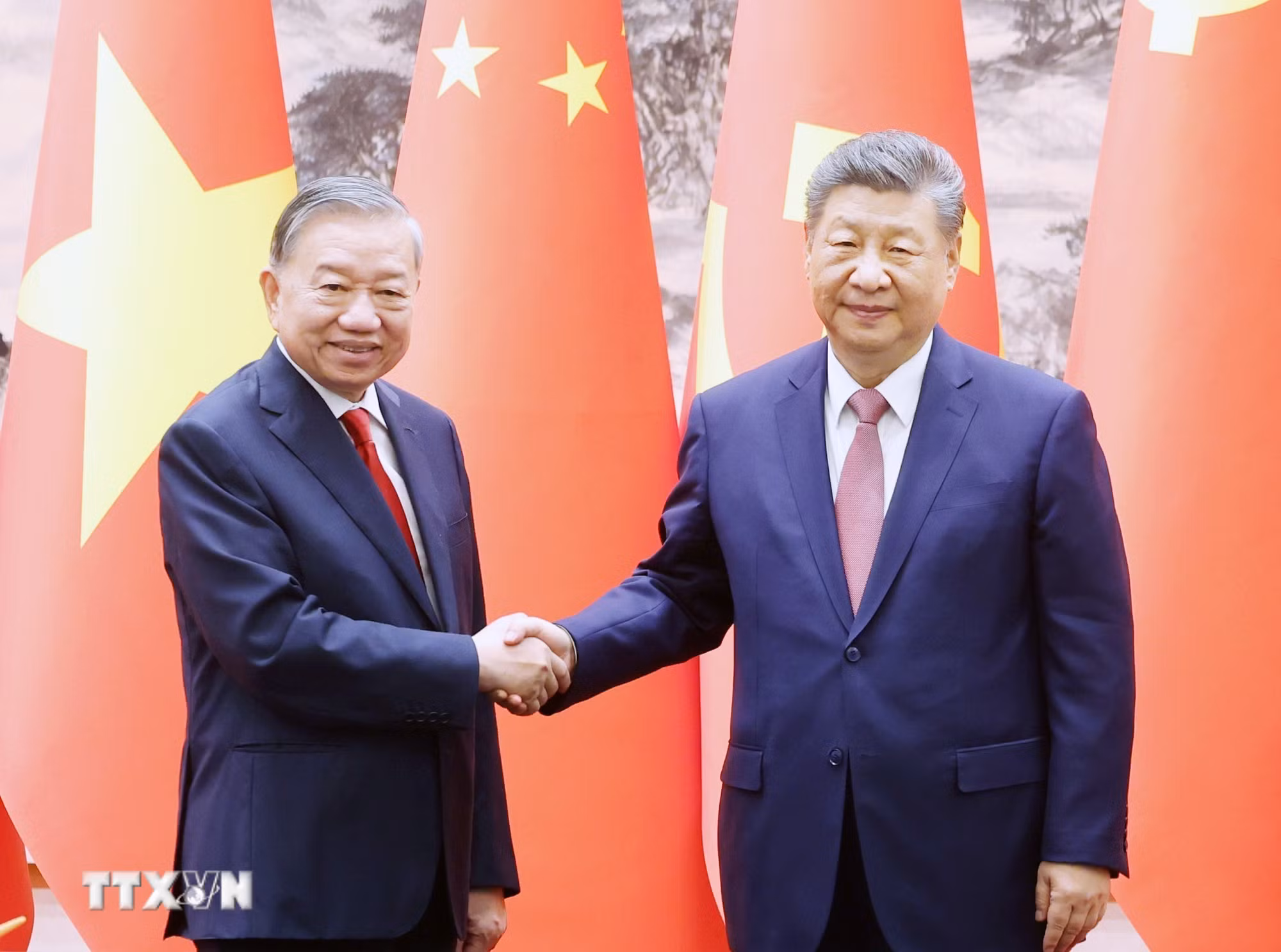 ttxvn-tong-bi-thu-chu-tich-nuoc-to-lam-va-tong-bi-thu-chu-tich-nuoc-tap-can-binh-tai-cuoc-chung-kien-le-ky-cac-van-kien-hop-tac-giua-hai-nuoc-anh-thong-nhat-ttxvn.jpg