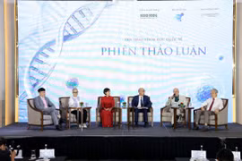 Các đại biểu chia sẻ tại Hội thảo. (Ảnh: PV/Vietnam+)