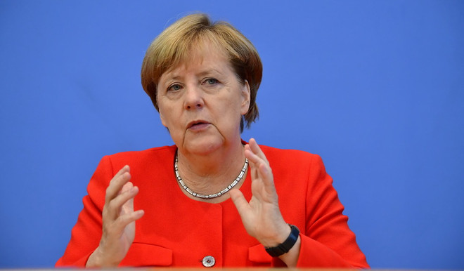 Thủ tướng Đức ủng hộ việc dỡ bỏ trừng phạt kinh tế đối với Nga ảnh 1