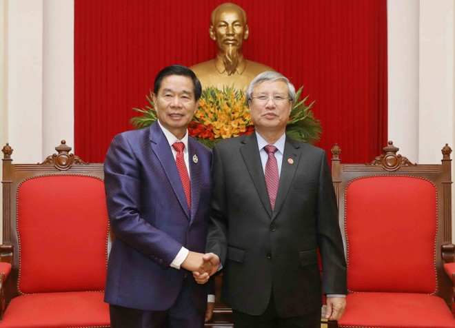 Thường trực Ban Bí thư tiếp đoàn đại biểu cấp cao thủ đô Vientiane ảnh 1