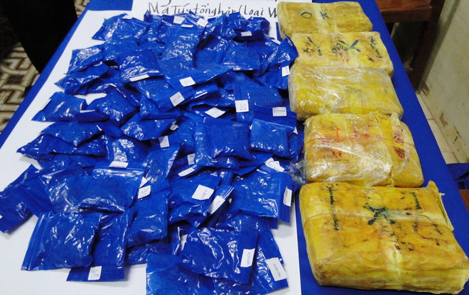 Bắt đối tượng người Lào định bán 30.000 viên ma túy vào Việt Nam ảnh 1