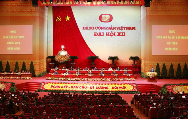 Thông cáo báo chí về ngày làm việc thứ ba Đại hội XII của Đảng ảnh 1